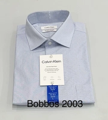 Calvin Klein Men's Wrinkle Free Dress Shirt, Light Blue, L (16-16.5-32/33) - Image 1 of 4