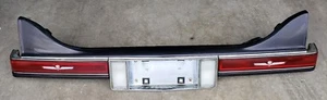 1986-1989 CADILLAC SEVILLE COMPLETE TRUNK PLAQUARD TAILIGHT PANEL - Picture 1 of 10