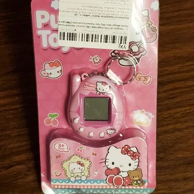 Hello Kitty Tamagotchi Pet Game Keychain Console Electronic Game Handheld Cute  - Image 1 of 4