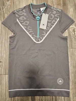 $130 Adidas by Stella McCartney TRUENATURE Golf Polo Gris Para Mujer Talla Pequeña Foto 1 de 4
