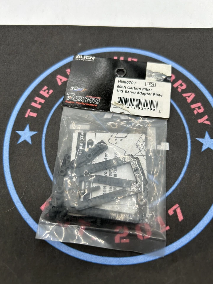 Align T-Rex 600. HN6070T 600N Carbon Fiber 18G Servo Adapter Plate - Image 1 of 1