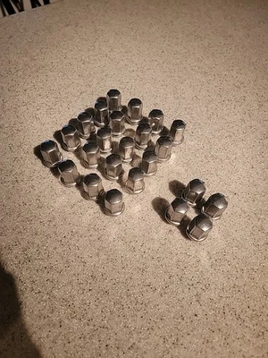 24 Dodge Ram 1500 Oem Lug Nuts For 2012  - Image 1 of 2