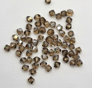 24pc Swarovski Crystal Lt Colorado Topaz Satin 4mm Bicone Beads; Tan w/ Matte - Picture 1 of 1