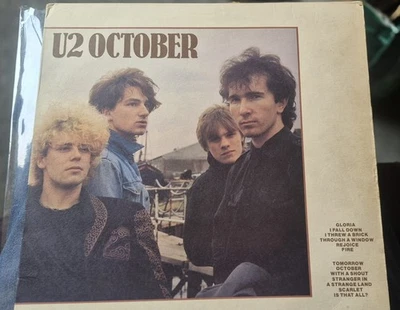 U2  Adam Clayton Autographed "October"  LP Cover CBS 85369 - Image 1 of 4