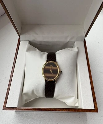 Reloj Baume & Mercier para mujer con carcasa de oro 14k Foto 1 de 4
