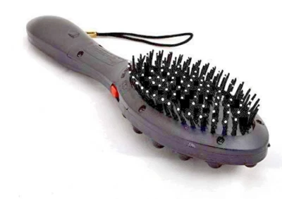 Vibrating magneticPlastic Brush Comb Hair Scalp Head, Face, Neck & Body Massager - Image 1 of 3