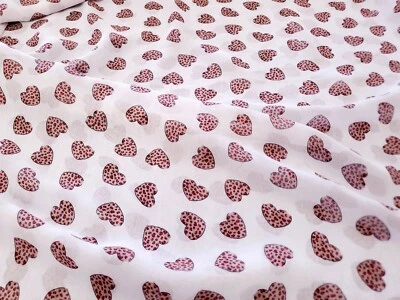 Ropa de tela de gasa con estampado de leopardo corazón por yarda  Foto 1 de 2