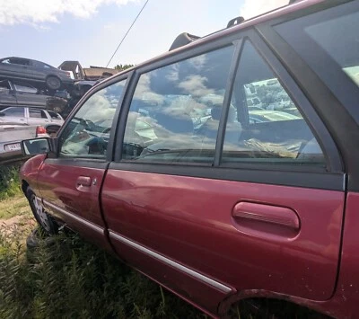 Mercury Tracer 1994 puerta trasera izquierda roja Foto 1 de 4