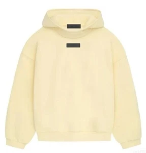 Neu Fear of God Essentials Pullover Hoodie "Garden Yellow" F/W23 192SP242051F - Bild 1 von 2