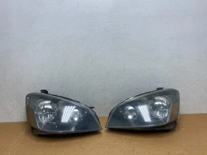 2005 to 2006 Nissan Altima Left+Right Side Set Halogen Headlights OEM N6007 DW - Picture 1 of 21
