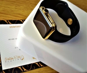 Apple Watch 24 carats édition or 42 mm acier inoxydable avec bracelet de sport noir 24 carats - Photo 1 sur 4
