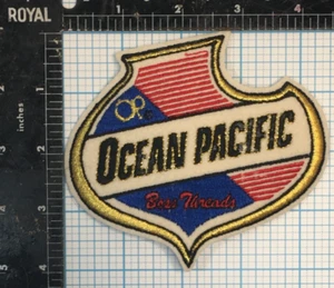 VINTAGE OCEAN PACIFIC CLOTHING COMPANY ADVERTISING PROMO 4.5" IRON ON PATCH - Picture 1 of 2