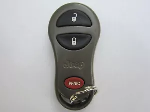 OEM 1999-2004 JEEP GRAND CHEROKEE KEYLESS REMOTE KEY FOB ALARM GQ43VT9T - Picture 1 of 2