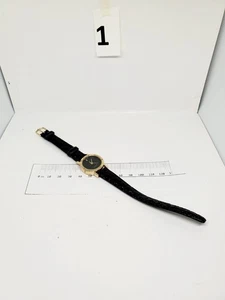 Elegante goldfarbene Damen Quarzuhr mit Diamanten und schwarzem Armband - Bild 1 von 8