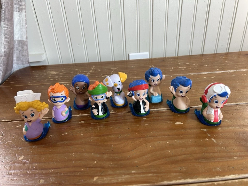 Lot of 9 Bubble Guppies Roll N' Go Sliders Figures Nickelodeon - Image 1 of 1