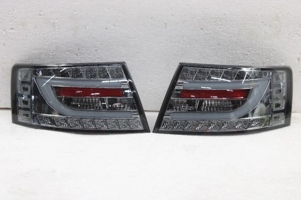 CONJUNTO DE PAR DE FREIOS DE LANTERNAS TRASEIRAS FUMÊ LED BARRA TUBO NEON AUDI A6 2005-2008 - Imagem 1 de 1