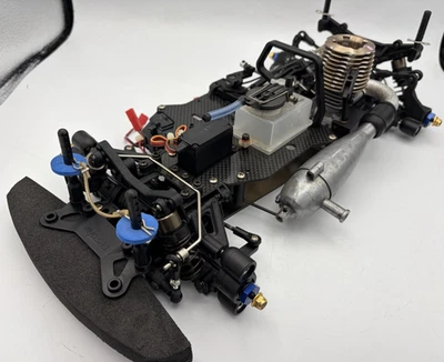 Pour pièces Kyosho moteur voiture V-One S ii 2 châssis 4x4 vintage rare - Photo 1/4