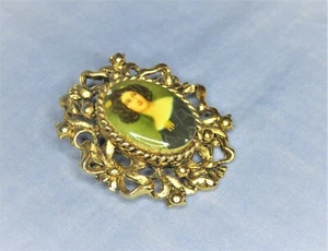 Vintage Oval Gold Tone Metal Brooch with Resin Based Picture of Young Lady - Picture 1 of 12