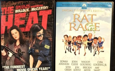 2 DVDs Bullock/McCarthy The Heat ,Rat Race Atkinson, Cleese, & more PET RESCUE - Image 1 of 4