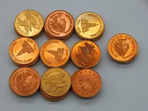 25 MIXED 70s Anniversary Advertising Bicentennial 20mm Eagle Indian Token TO264 - Picture 1 of 3