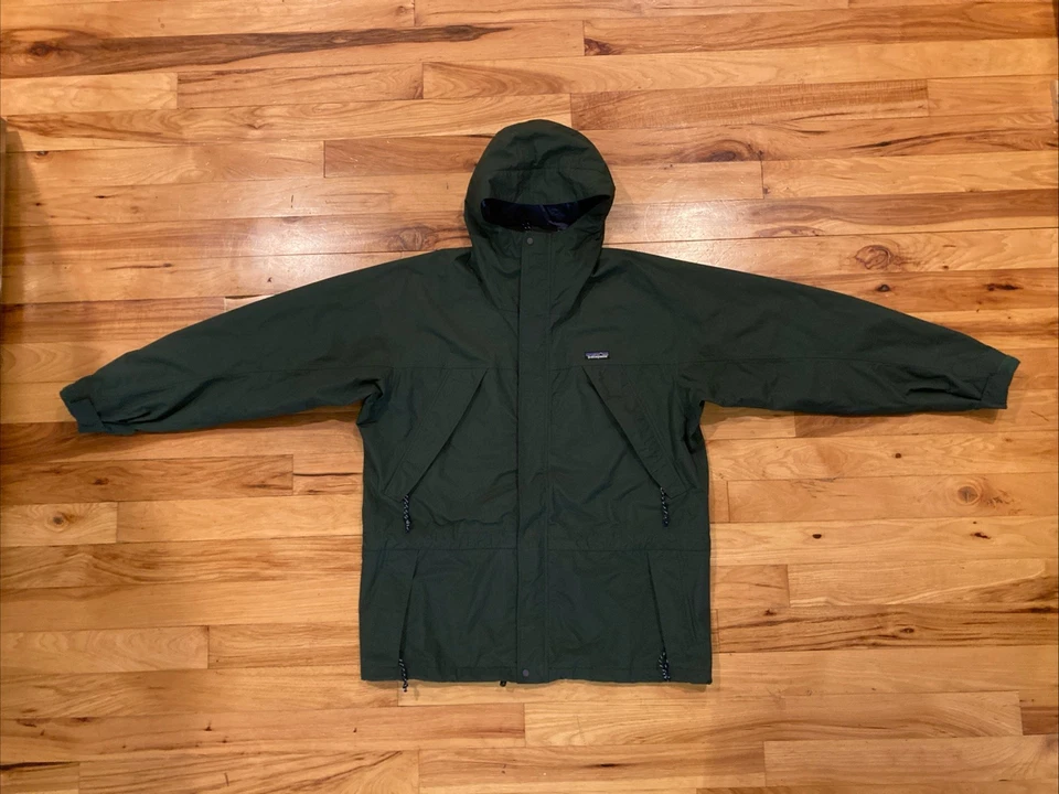 Chaqueta de lluvia verde parka de nailon con bolsillos con capucha Patagonia vintage grande para hombre Foto 1 de 4