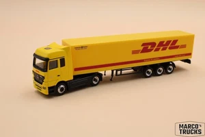Schuco MB Mercedes Actros MP2 LH box semitrailer “Deutsche Post DHL” 1:87 /S243 - Picture 1 of 1