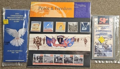 Lote de monedas y estampillas de la Segunda Guerra Mundial. Estampillas y monedas conmemorativas de la Casa de la Moneda Real. Nuevo, en embalaje Foto 1 de 4