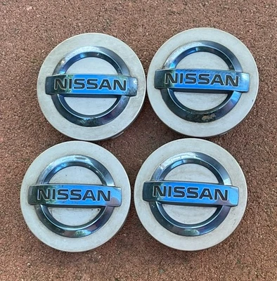 Tapacubos centrales de rueda Nissan Silver AZUL 54 mm para LEAF Altima Máxima Murano Rogue Foto 1 de 4