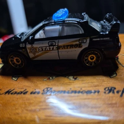 2012 Matchbox MBX Heroic Rescue #94/120 Subaru Impreza WRX Police Black 1:64 NM - Image 1 of 4