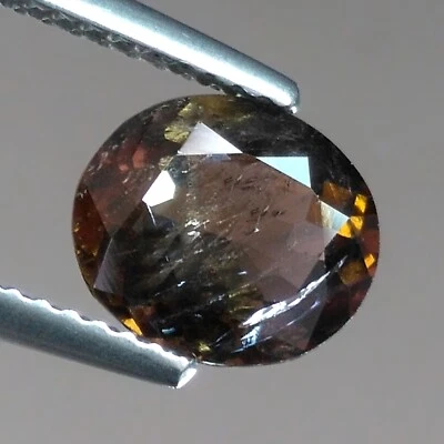 Piedras preciosas genuinas sueltas de axinita natural ovaladas gemas raras de 1,78 quilates Foto 1 de 4