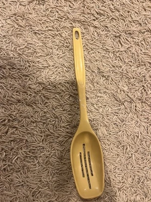 Vintage Foley Nylon Plastic Yellow Cream Slotted spoon - Image 1 of 4