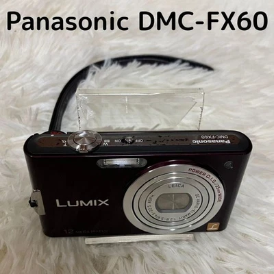 Appareil photo numérique compact Panasonic LUMIX DMC FX60 avec écran LCD jaun... - Photo 1/4