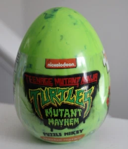TMNT Teenage Mutant Ninja Turtles Mutant Mayhem 100 PC Puzzle Egg Michelangelo - Picture 1 of 4