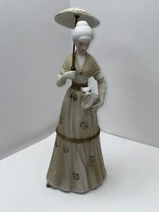 Mujer de porcelana antes de la guerra UCGC vintage años 50 con paraguas y gato en mano - Imagen 1 de 8