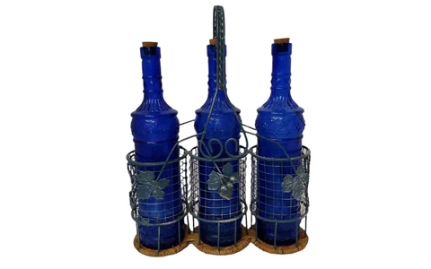 Vintage Cobalt Blue bottles in ornate wire basket with wine leaf detail and wick Cover