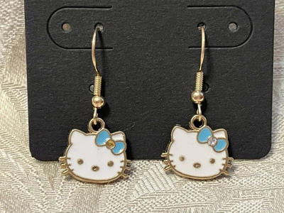 Sanrio Hello Kitty Azul Gema Arco Dije Oro Gota Cuelga Adorables Pendientes Moda Foto 1 de 2