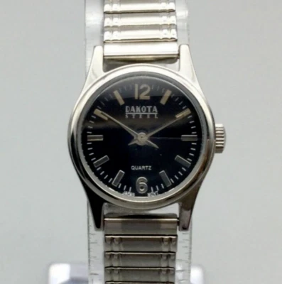 Reloj Dakota Acero Mujer 20mm Tono Plateado Esfera Negra Banda Elástica Batería Nueva Foto 1 de 4