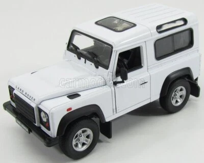 MODELLINO AUTO STATICO DIECAST LAND ROVER DEFENDER 90 1984 BIANCO SCALA 1/24 - Immagine 1 di 4