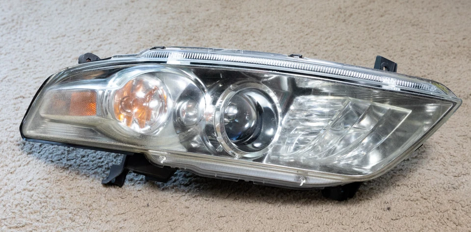 Faro lateral izquierdo Infiniti FX35 FX45 2004-2008 OEM LH xenón HID sin pestañas rotas Foto 1 de 4