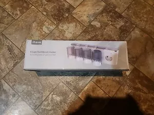 ihave 4 cups Toothbrush Holder&Toothpaste Dispenser Set Never Used - Picture 1 of 3