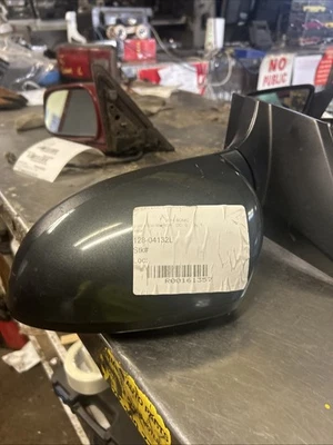 Espejo retrovisor eléctrico izquierdo Chevrolet Sonic 2012-19 color carbón Foto 1 de 4