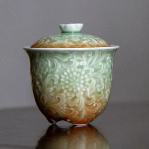 Té de cerámica con relieve de flores talladas Celadon estilo chino retro Gaiwan - Imagen 1 de 6