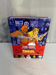 He-Man and She-Ra: A Complete Guide to the - Hardcover by Eatock James - Imagen 1 de 7