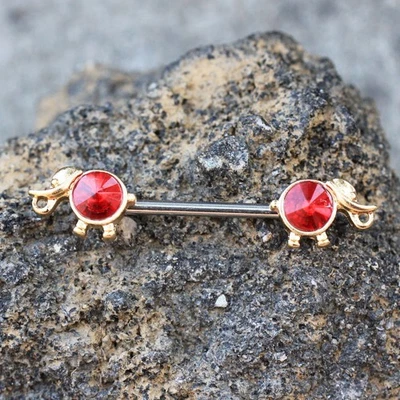 PAR de barra de pezón de elefante chapada en oro circonita roja Foto 1 de 4