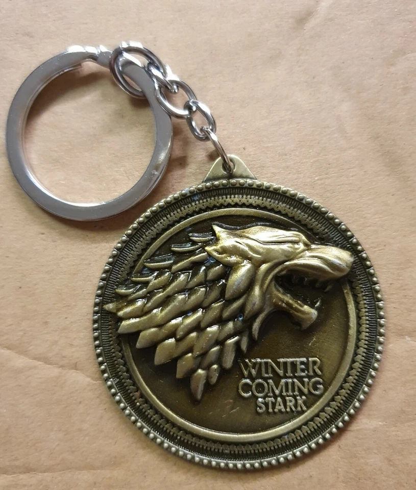 Game of Thrones Stark Winter is Coming Bronze Keyring UK Seller Free P&P - Immagine 1 di 3