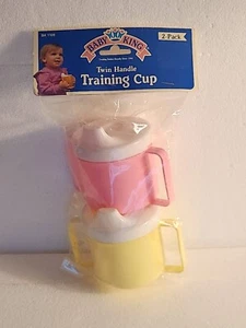 VINTAGE BABY KING TWIN HANDLE TRAINING CUPS 2PK ( NEW ) PINK , YELLOW - Picture 1 of 1