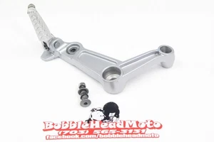 20-22 APRILIA RS660 OEM JUEGO TRASERO IZQUIERDO ESTRIBA CONDUCTOR REPOSAPIÉS TOPE G9 - Imagen 1 de 11