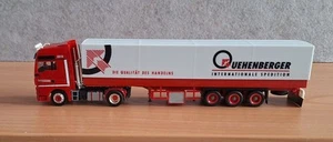 Herpa MAN der Spedition Quehenberger mit Pr.-Planen-Auflieger / gesupert - Bild 1 von 4