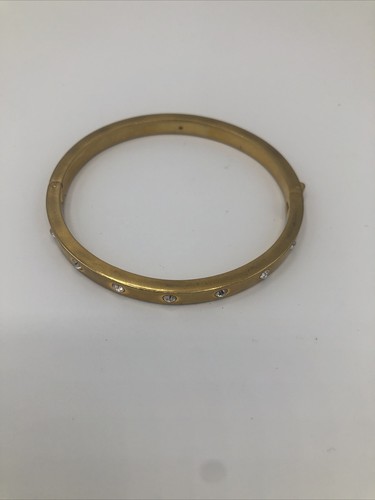 Bracciale Kate Spade tono oro con strass incastonati incernierati