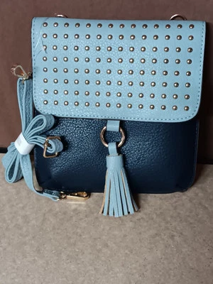 Bandolera Carlos Santana imitación cuero azul claro y oscuro cierre a presión con borla Foto 1 de 4